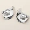 Fashnzfab Faceted Center Stone Accent Sculpted Wave Metal Plate Earrings In Metallic