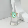 Fashnzfab Faceted Oval Stone Cluster Stretch Ring In Green