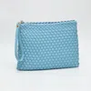 Fashnzfab Faux Braided Leather Clutch Bag In Blue