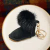 Fashnzfab Faux Fur Pom Pom Boot Keychain In Black