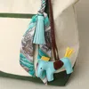 Fashnzfab Faux Leather Horse Tassel Scarf Keychain / Bag Charm In Blue
