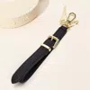 Fashnzfab Faux Leather Key Accent Belt Wristlet Keychain Strap Bag Charm In Black