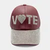 Fashnzfab Faux Leather Vote Message Rhinestone Embellished Baseball Cap In White
