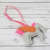 Fashnzfab Faux Leather Winged Horse Bag Charm In Gray
