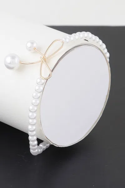 Fashnzfab Faux Pearl Bow Bracelet In Gold