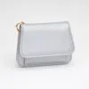 Fashnzfab Faux Pebble Leather Compact Card Wallet Bag Charm In Silver