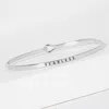 Fashnzfab Fearless Message Brass Thin Hook Bracelet In Metallic