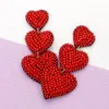 Fashnzfab Felt Back Beaded Triple Heart Link Dangle Earrings In Red