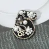 Fashnzfab Felt Back Pearl Enamel Flower Embellished Tweed Number Five Pin Brooch In Black