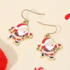 Fashnzfab Festive Skating Santa Dangle Earrings In Gold