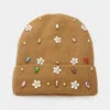 Fashnzfab Fleece Lining Daisy Flower Stone Embellished Solid Knit Beanie Hat In Brown