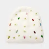 Fashnzfab Fleece Lining Daisy Flower Stone Embellished Solid Knit Beanie Hat In White