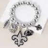 Fashnzfab Fleur De Lis Football Theme Charms Metal Ball Stretch Bracelet Rhodium In Multi