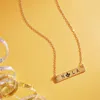 Fashnzfab Fleur De Lis Pointed Nola Message Pendant Necklace In Gold