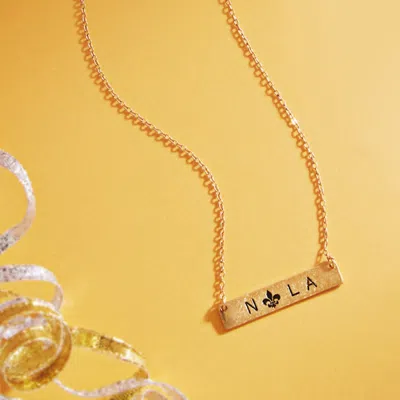 Fashnzfab Fleur De Lis Pointed Nola Message Pendant Necklace In Gold