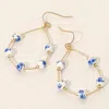 Fashnzfab Floral Ceramic Ball Station Open Teardrop Dangle Earrings - Blue In Gold
