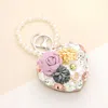 Fashnzfab Floral Pearl Multi Bead Embellished Heart Compact Mirror / Keychain In White