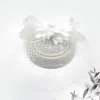 Fashnzfab Flower Bead Feather Netting Pearl Accented Fascinator / Headband In White