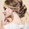 Fashnzfab Flower Centered Stone Embellished Leaf Cluster Hair Comb In Gold