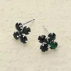 Fashnzfab Flower Stone Stud Earrings In Black