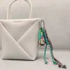 Fashnzfab Football Gameday Message Beaded Name Tag Braided Thread Keychain / Bag Charm In Multi