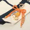 Fashnzfab Football Themed Charm Game Day Message Beaded Rope Bow Accent Keychain / Bag Charm In Multi