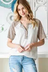 Fashnzfab Full Size Animal Print Half Button Short Sleeve Top In White