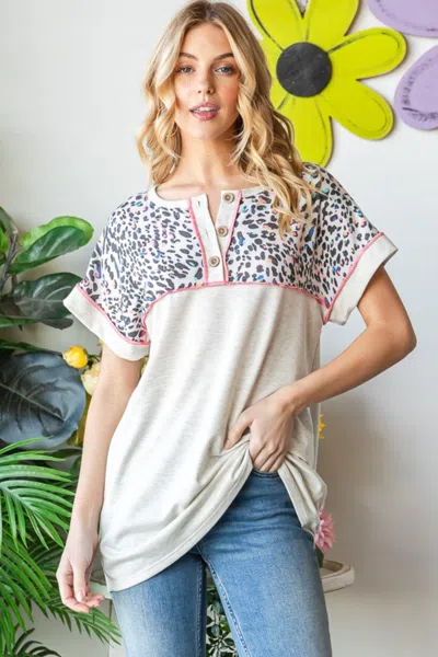 Fashnzfab Full Size Exposed Seam Leopard Short Sleeve T-shirt In White