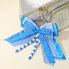 Fashnzfab Game Day Theme Triple Layered Bow Bag Charm / Keychain In Blue