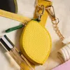 Fashnzfab Genuine Leather Lemon Coin Purse Keychain Bag Charm In Yellow