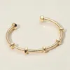 Fashnzfab Geometric Metal Cuff Bracelet In Gold