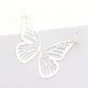 Fashnzfab Glitter Cutout Butterfly Dangle Earrings In Brown