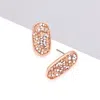 Fashnzfab Glitter Stone Oval Stud Earrings In Gold