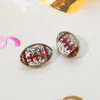 Fashnzfab Glittered Football Stud Earrings In Gold