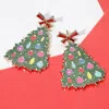 Fashnzfab Glittered Resin Bow Topper Christmas Tree Earrings In Green