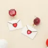 Fashnzfab Glittered Resin Heart Envelope Dangle Earrings In Red