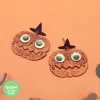 Fashnzfab Glow In The Dark Halloween Pumpkin Face Dangle Earrings In Pink