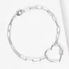 Fashnzfab Gold Dipped Cz Stone Paved Open Heart Carabiner Pointed Paperclip Chain Bracelet In Metallic