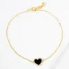 Fashnzfab Gold Dipped Cz Stone Paved Rim Heart Charm Pointed Bracelet Black, Gold In Multi