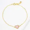 Fashnzfab Gold Dipped Cz Stone Paved Rim Heart Charm Pointed Bracelet Gold, Pink In Multi