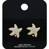 Fashnzfab Gold Dipped Cz Stone Paved Starfish Stud Earrings In Gold