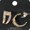 Fashnzfab Gold Dipped Cz Stone Paved Twist Knot Hoop Earrings In Gold