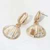 Fashnzfab Gold Dipped Puka Seashell Dangle Earrings In Gold