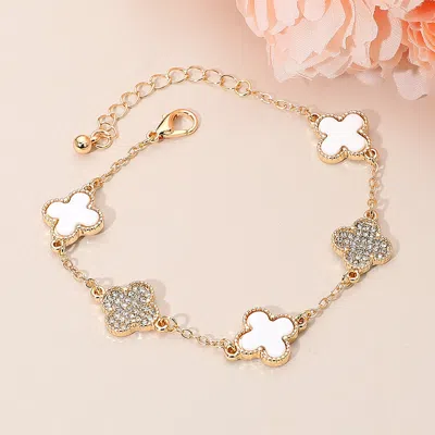 Fashnzfab Gold Dipped Quatrefoil Charm Link Station Bracelet In Silver
