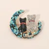 Fashnzfab Gold Dipped Rhinestone Embellished Cat And Moon Pin Brooch In Multi