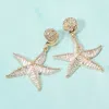 Fashnzfab Gold Dipped Starfish Dangle Statement Earrings In Gold
