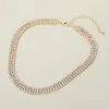Fashnzfab Gold Dipped Triple Row Rhinestone Necklace In Multi