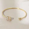 Fashnzfab Gold Plated Cz Stone Butterfly Tip Cuff Bracelet Gold In Gold