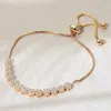 Fashnzfab Gold Plated Cz Stone Lariat Pull Tie Bracelet Gold In Gold