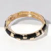 Fashnzfab Gold Plated Geographic Patterned Enamel Hinged Bangle Bracelet Black In Black